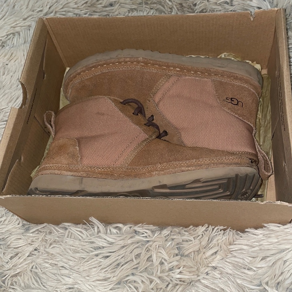 Ugg boots, a little worn. A couple scuffs.